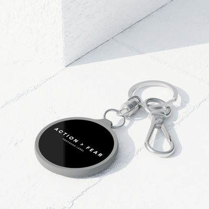 ACTION IS GREATER THAN FEAR KEYRING
